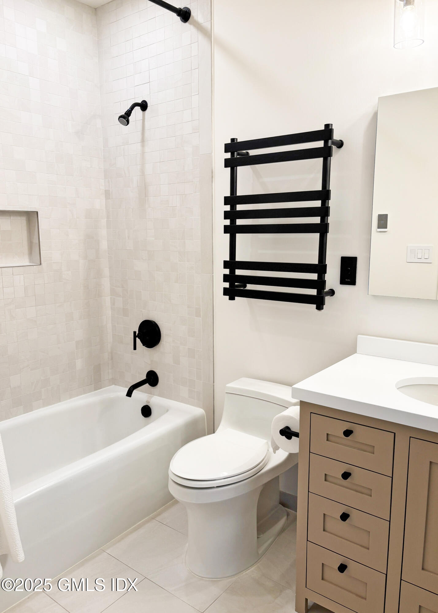 28 Thunder Mountain Road Greenwich, CT 06831 - Photo 24 of 32 a bathroom with a toilet a sink and a bathtub