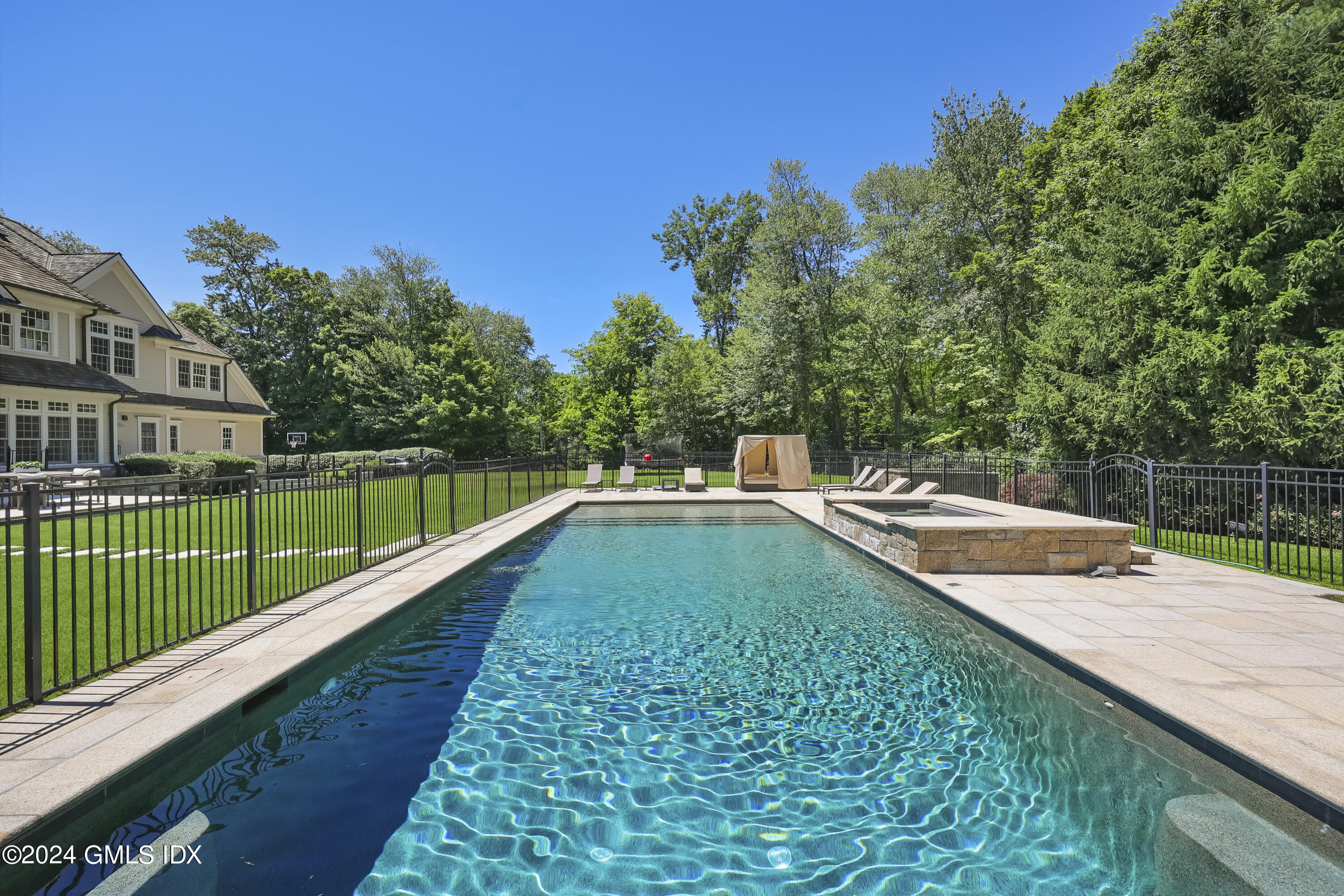 28 Thunder Mountain Road Greenwich, CT 06831 - Photo 3 of 32 a view of swimming pool from a balcony