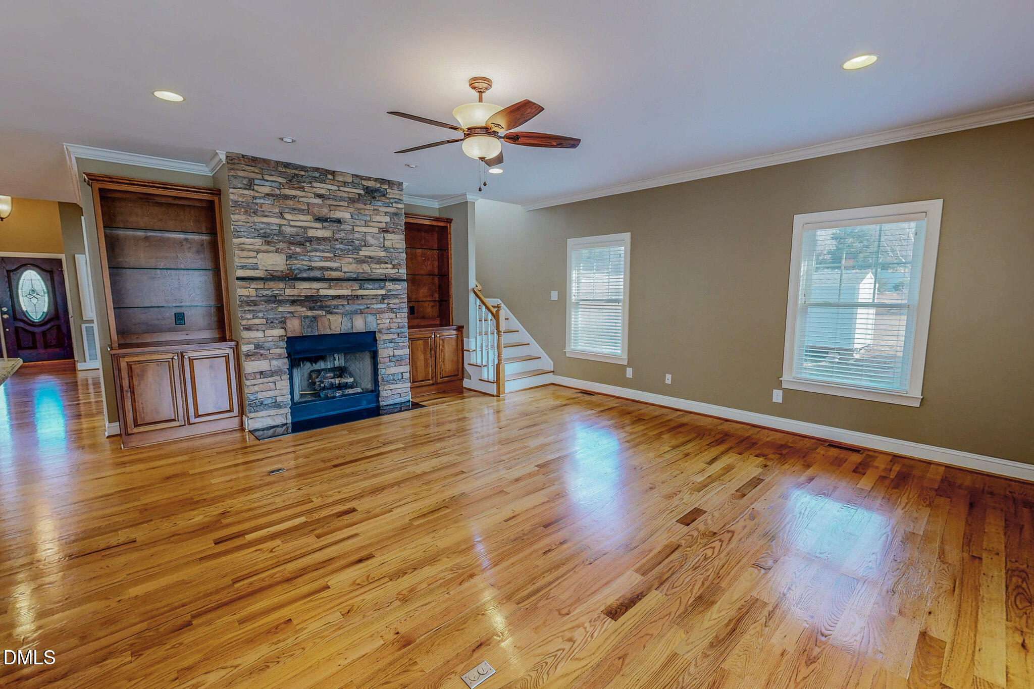 84 MacBeth Lane Roxboro, NC 27574 - Photo 17 of 64 an empty room with wooden floor fireplace and window