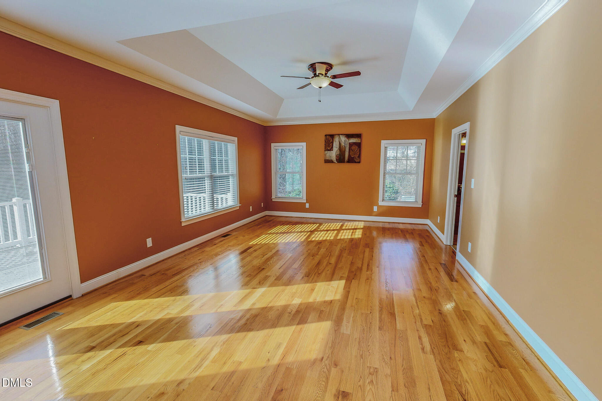 84 MacBeth Lane Roxboro, NC 27574 - Photo 22 of 64 a view of an empty room with wooden floor and a window
