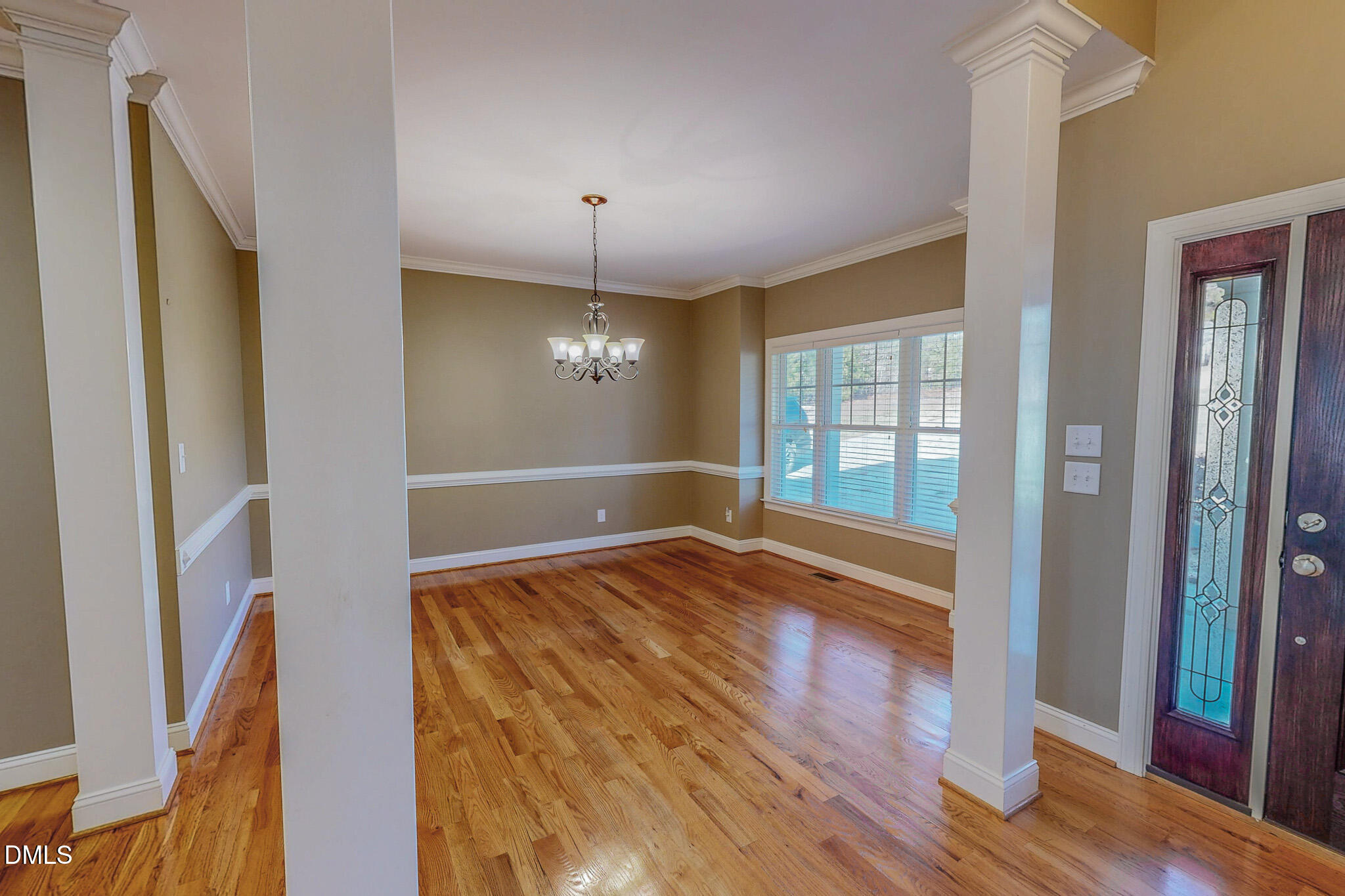 84 MacBeth Lane Roxboro, NC 27574 - Photo 31 of 64 a view of empty room with wooden floor and fan