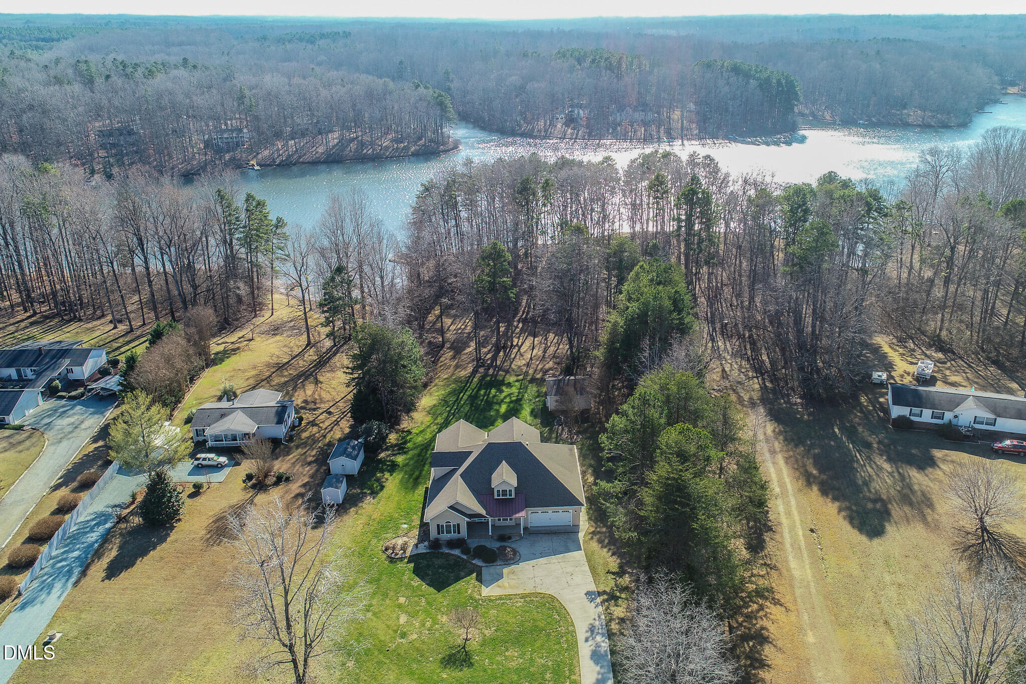 84 MacBeth Lane Roxboro, NC 27574 - Photo 33 of 64 a aerial view of a house with a yard and lake view