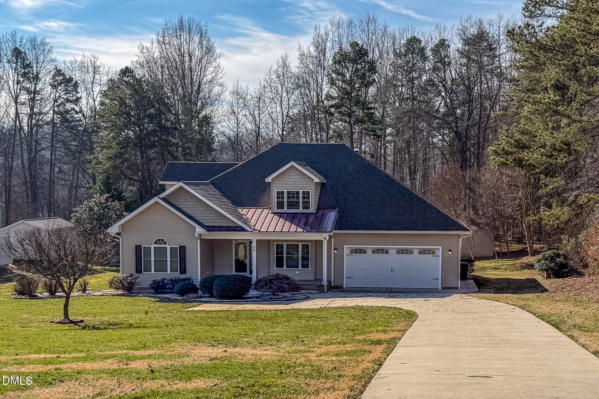 84 MacBeth Lane Roxboro, NC 27574 - Photo 37 of 64 a front view of a house with garden