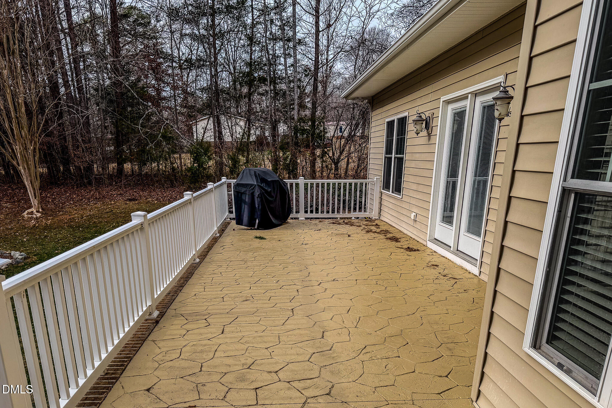84 MacBeth Lane Roxboro, NC 27574 - Photo 40 of 64 a view of a balcony with wooden floor and fence
