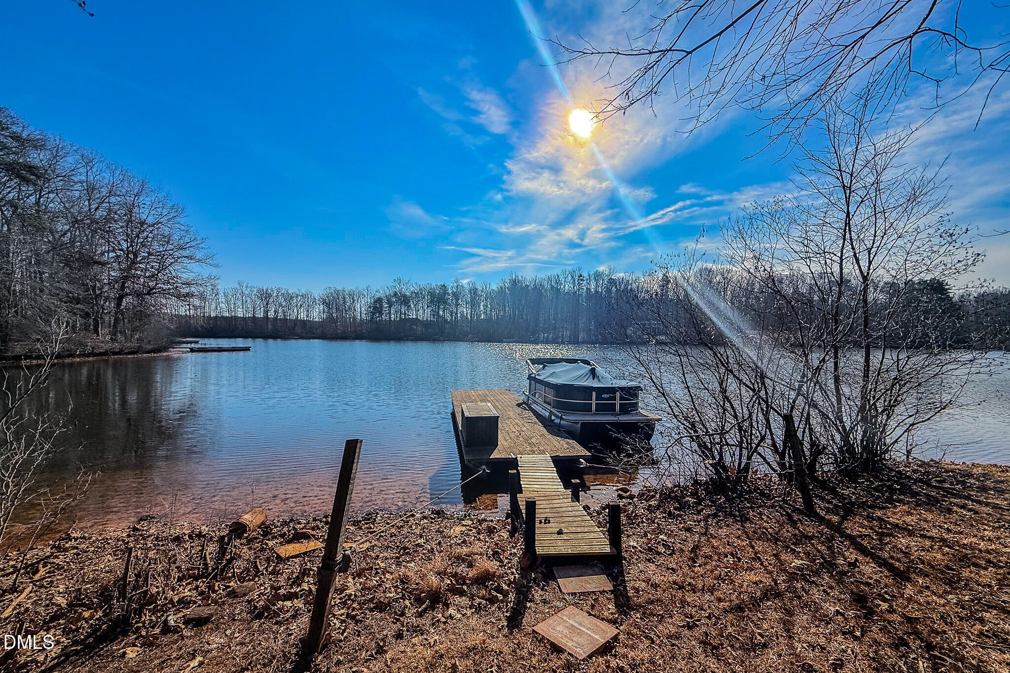 84 MacBeth Lane Roxboro, NC 27574 - Photo 42 of 64 a backyard of a house with table and chairs