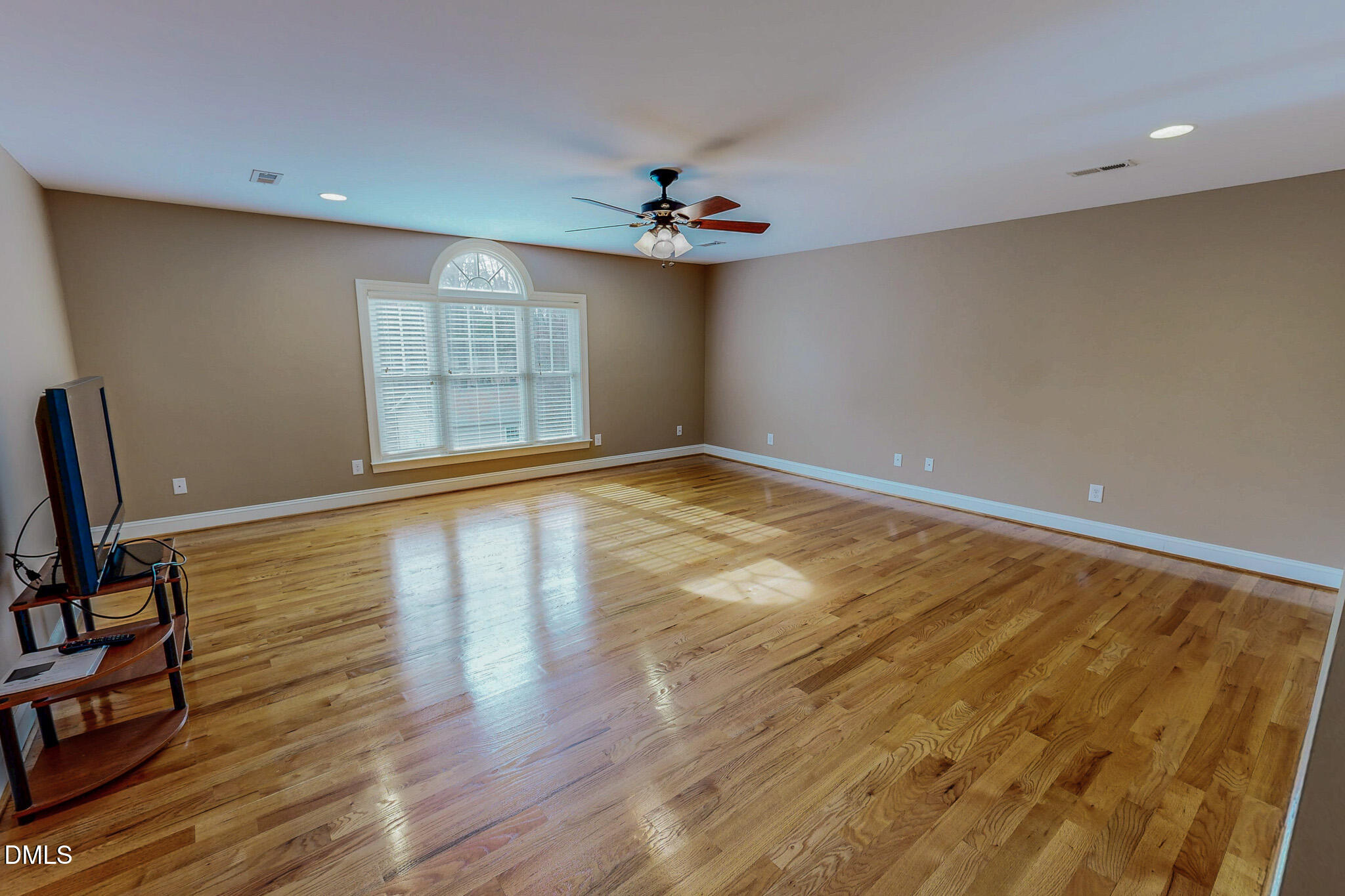 84 MacBeth Lane Roxboro, NC 27574 - Photo 57 of 64 wooden floor in an empty room with a window