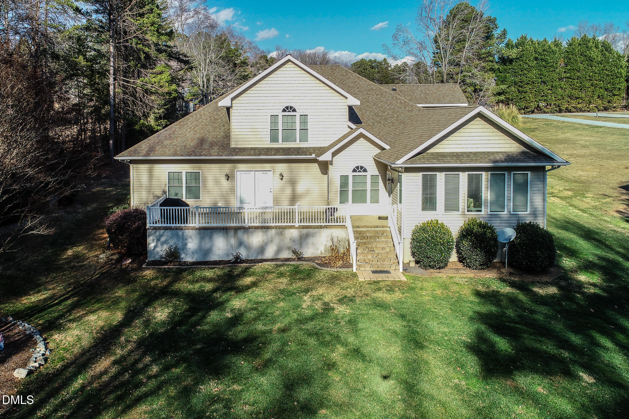 84 MacBeth Lane Roxboro, NC 27574 - Photo 7 of 64 a view of a house with a yard and plants