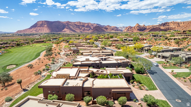 2331 West Entrada Trail, Unit 61 St. George, UT 84770 - Photo 69 of 69 Aerial perspective showcasing multiple properties with flat roofs and stucco exteriors