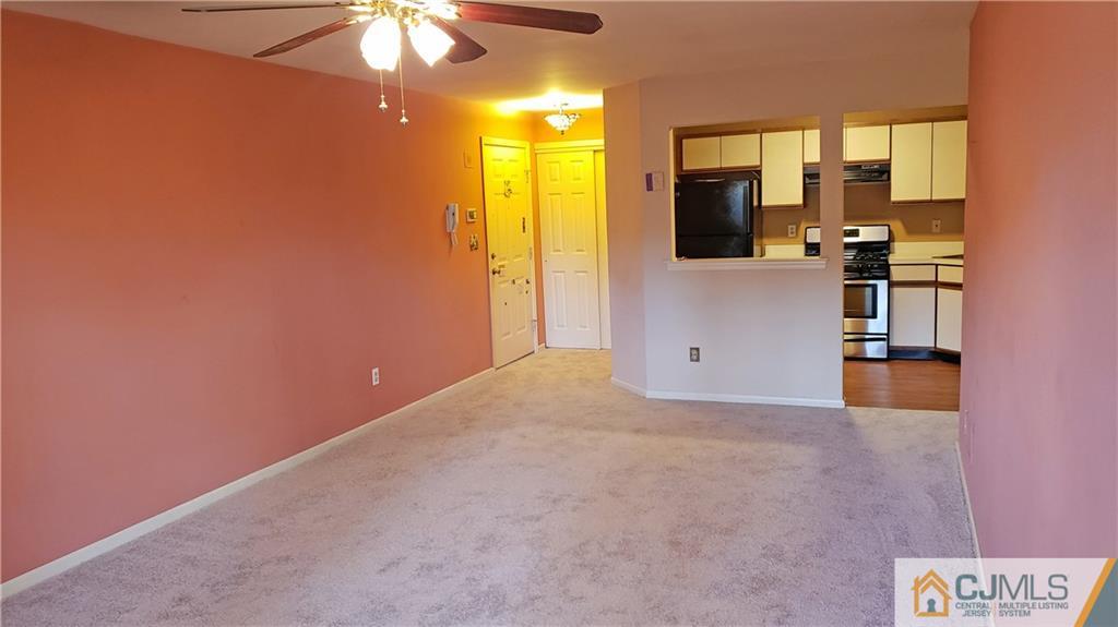 710 Meadow Court, Unit 710 Helmetta, NJ 08828 - Photo 8 of 11 a view of a kitchen with a sink