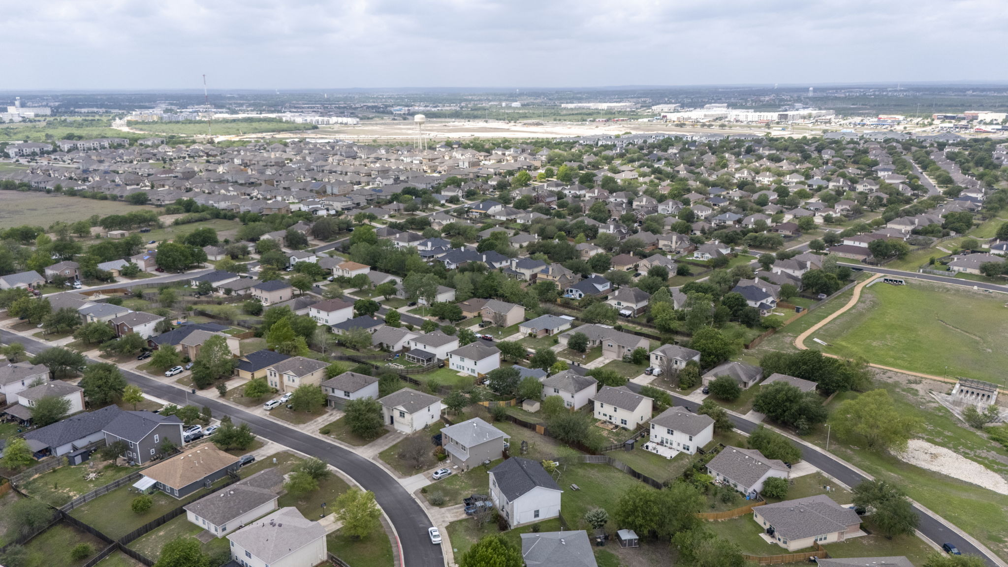 208 Dandelion Loop Kyle, TX 78640 - Photo 38 of 39 Aerial view of the surrounding residential neighborhood