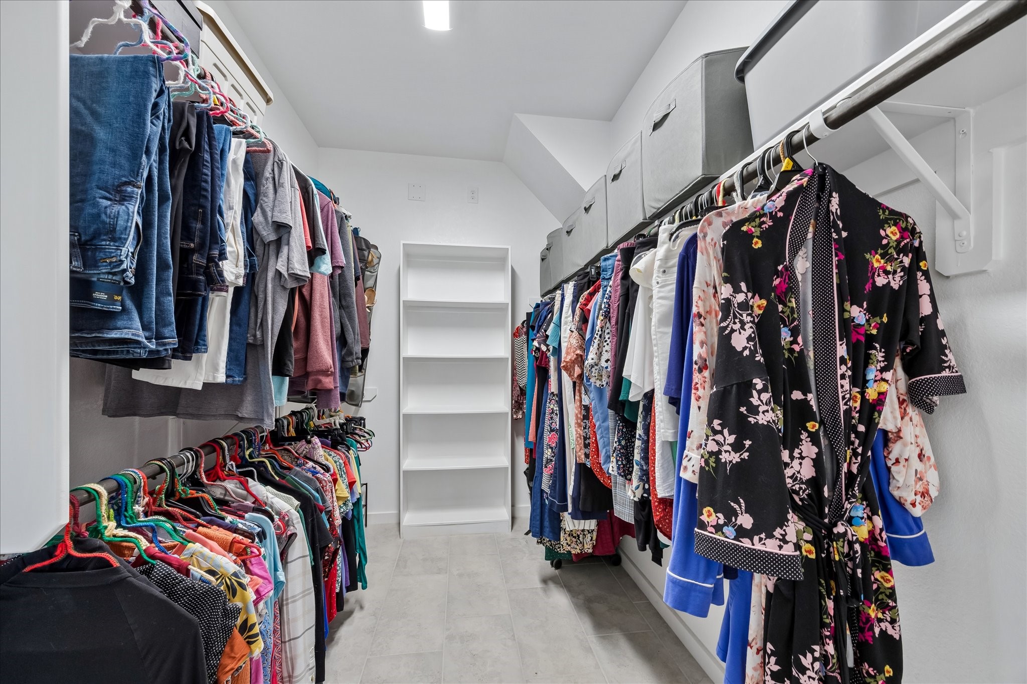 33002 Carolyns Perfection Loop Fulshear, TX 77441 - Photo 17 of 29 a view of walk in closet with clothes and shoes