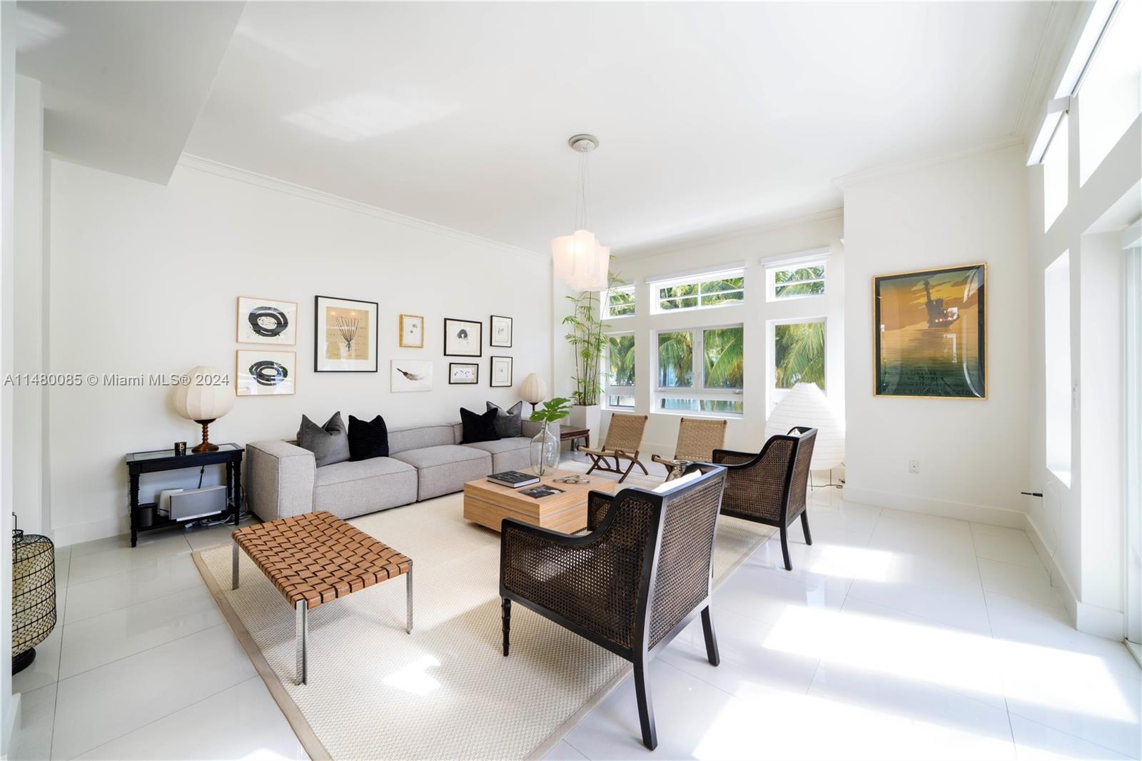 6010 Aqua Path Miami Beach, FL 33141 - Photo 14 of 65 a living room with furniture and a window