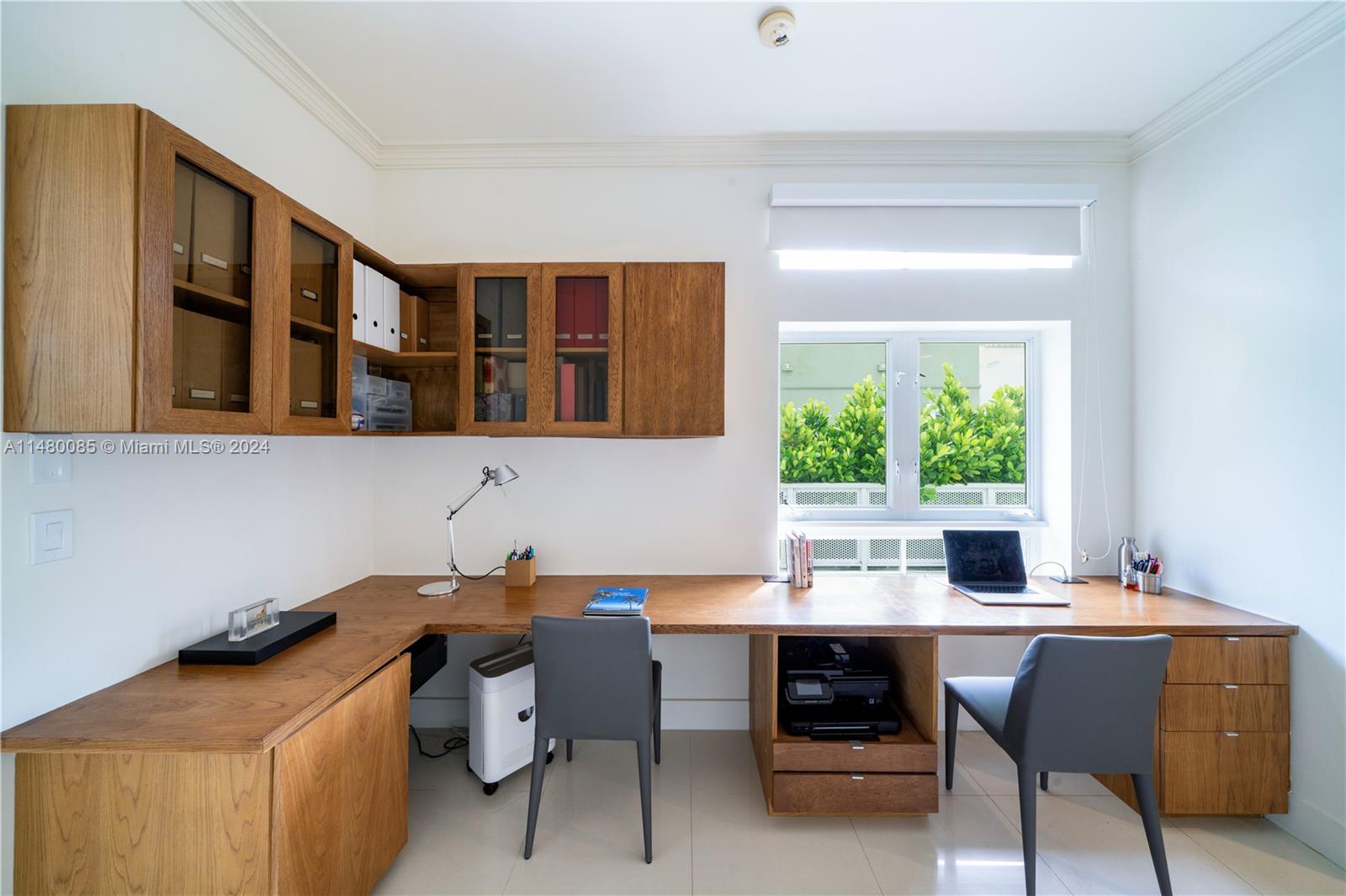 6010 Aqua Path Miami Beach, FL 33141 - Photo 43 of 65 a workspace with furniture and window