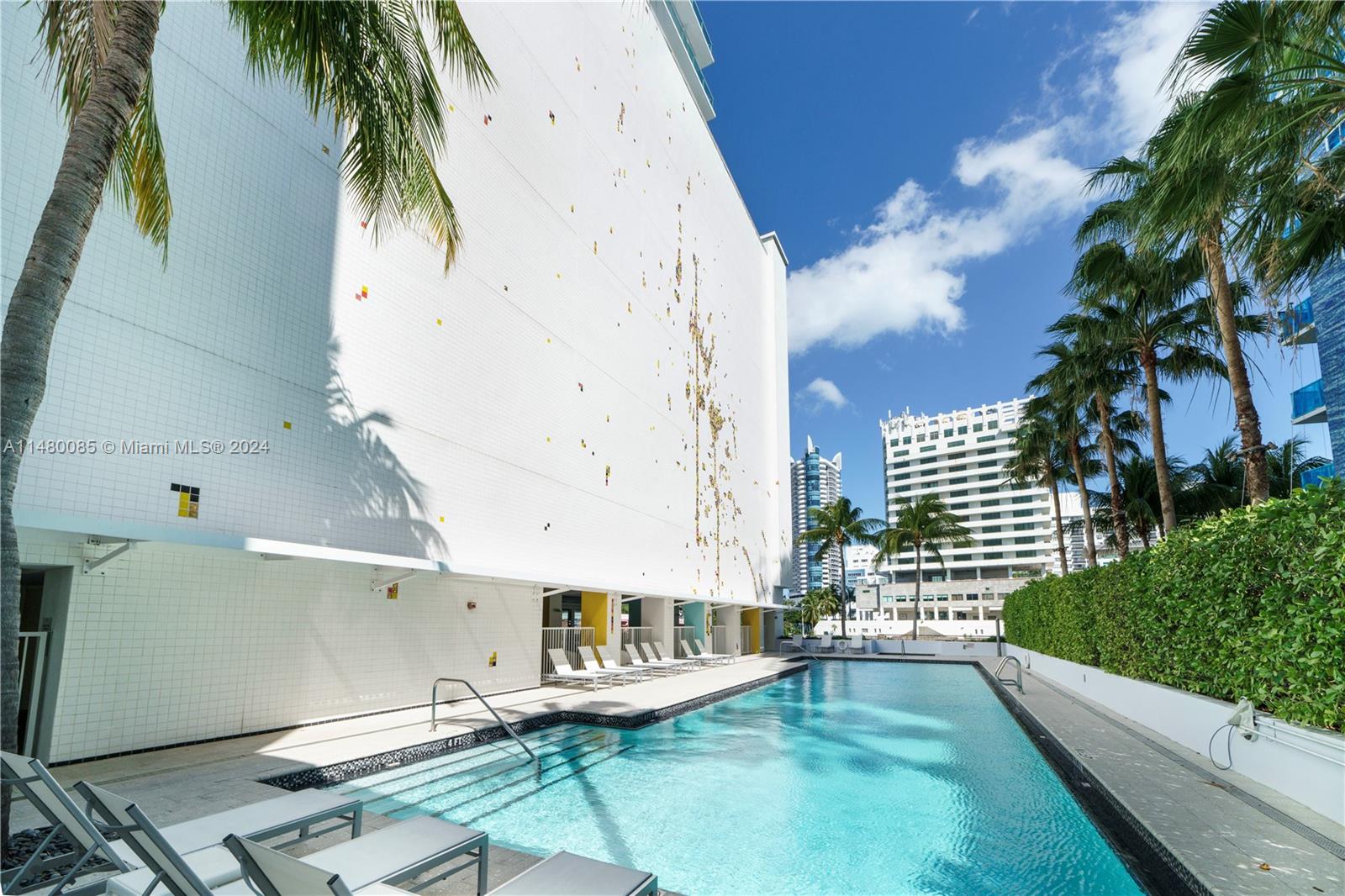 6010 Aqua Path Miami Beach, FL 33141 - Photo 47 of 65 a view of a backyard with plants