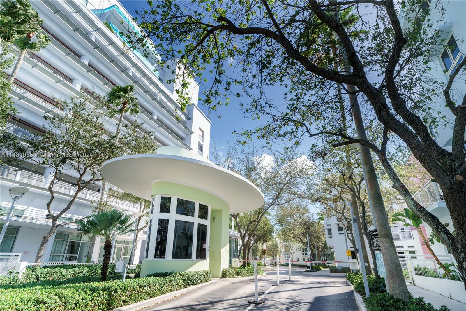 6010 Aqua Path Miami Beach, FL 33141 - Photo 52 of 65 a front view of a house with garden