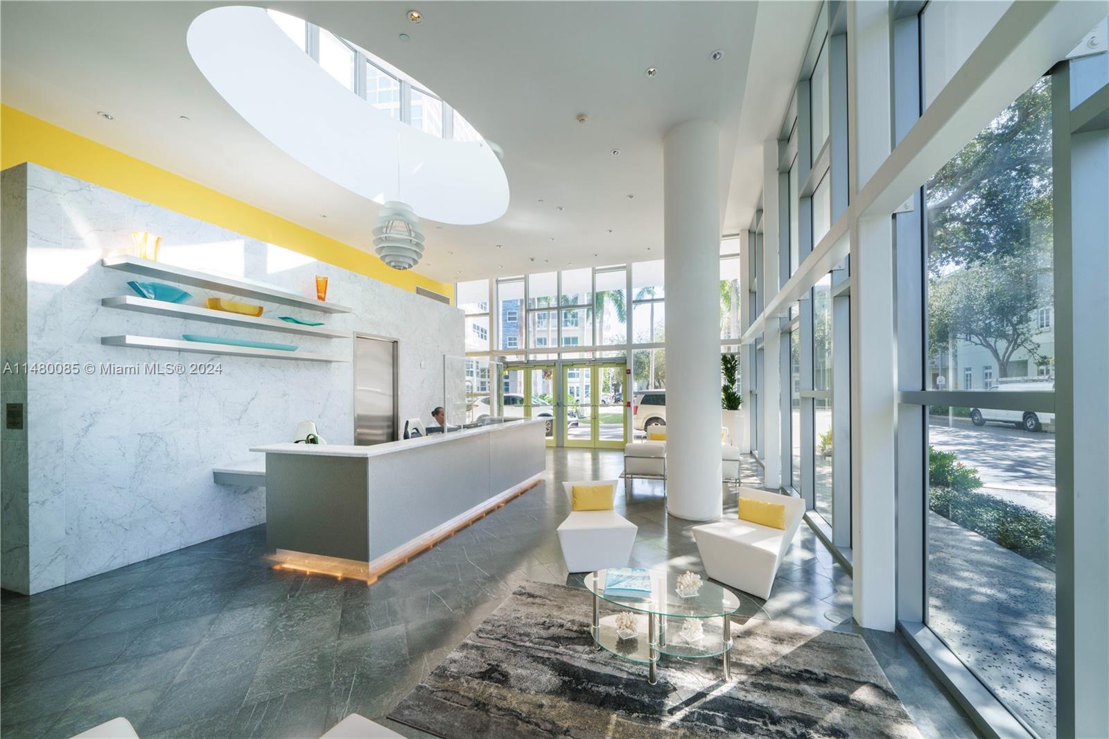 6010 Aqua Path Miami Beach, FL 33141 - Photo 54 of 65 a living room with furniture and a large window