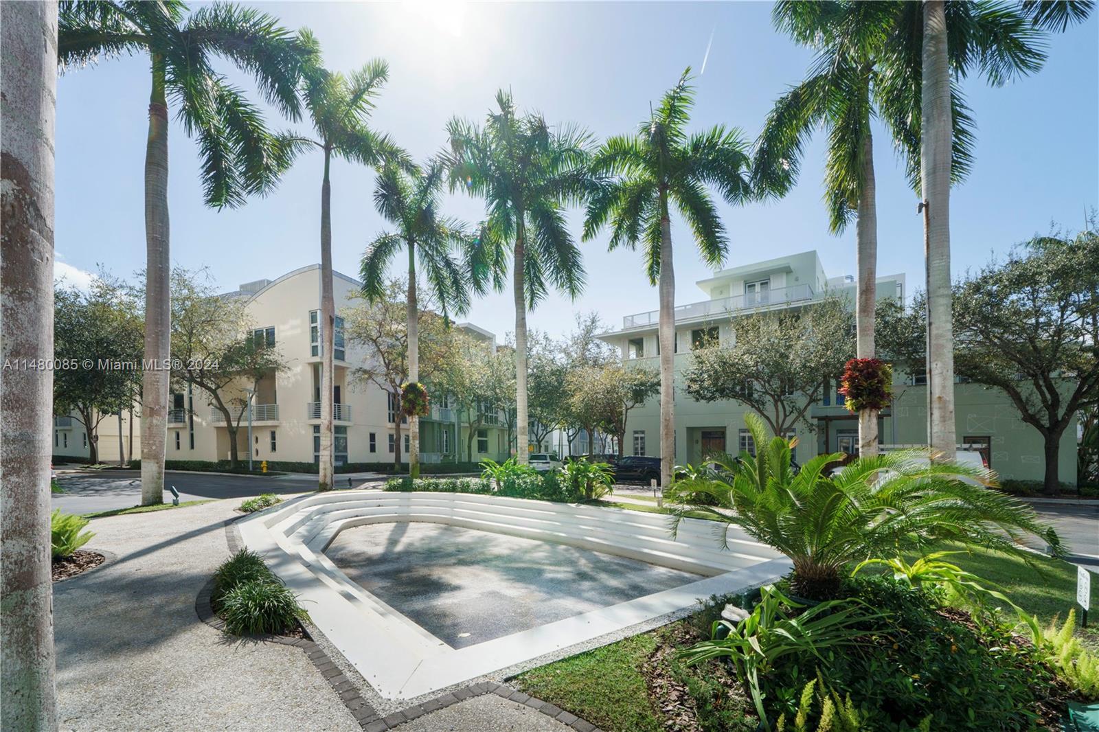 6010 Aqua Path Miami Beach, FL 33141 - Photo 55 of 65 a garden with palm trees