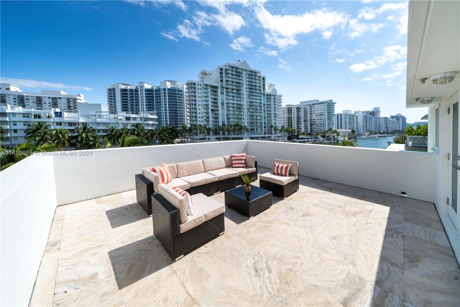 6010 Aqua Path Miami Beach, FL 33141 - Photo 8 of 65 a view of terrace with seating space and city view