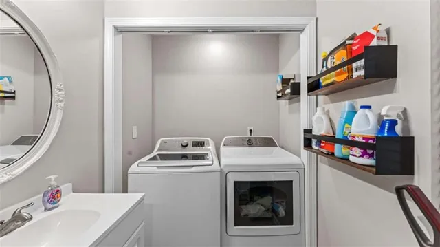 a utility room with dryer and washer