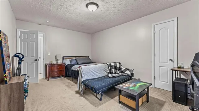 a bedroom with furniture and a couch