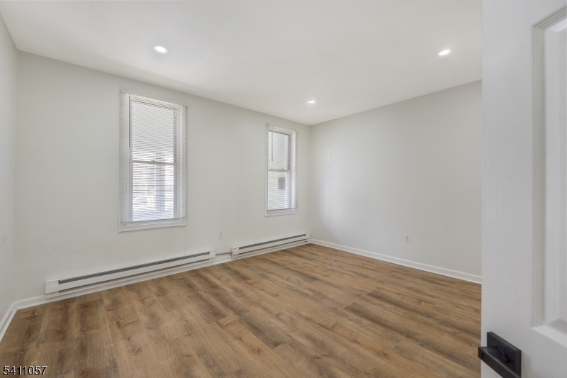 629 Magnolia Avenue Elizabeth Port, NJ 07206 - Photo 7 of 24 a view of an empty room with a window