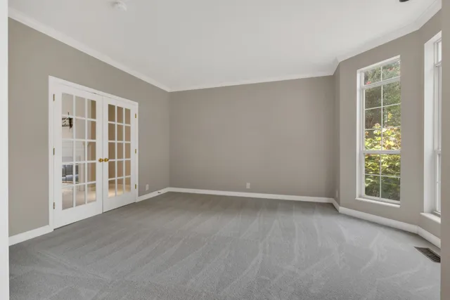 a kitchen with a sink stove and microwave