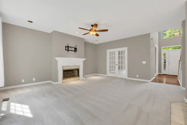 a view of a kitchen with a sink and a refrigerator cabinets