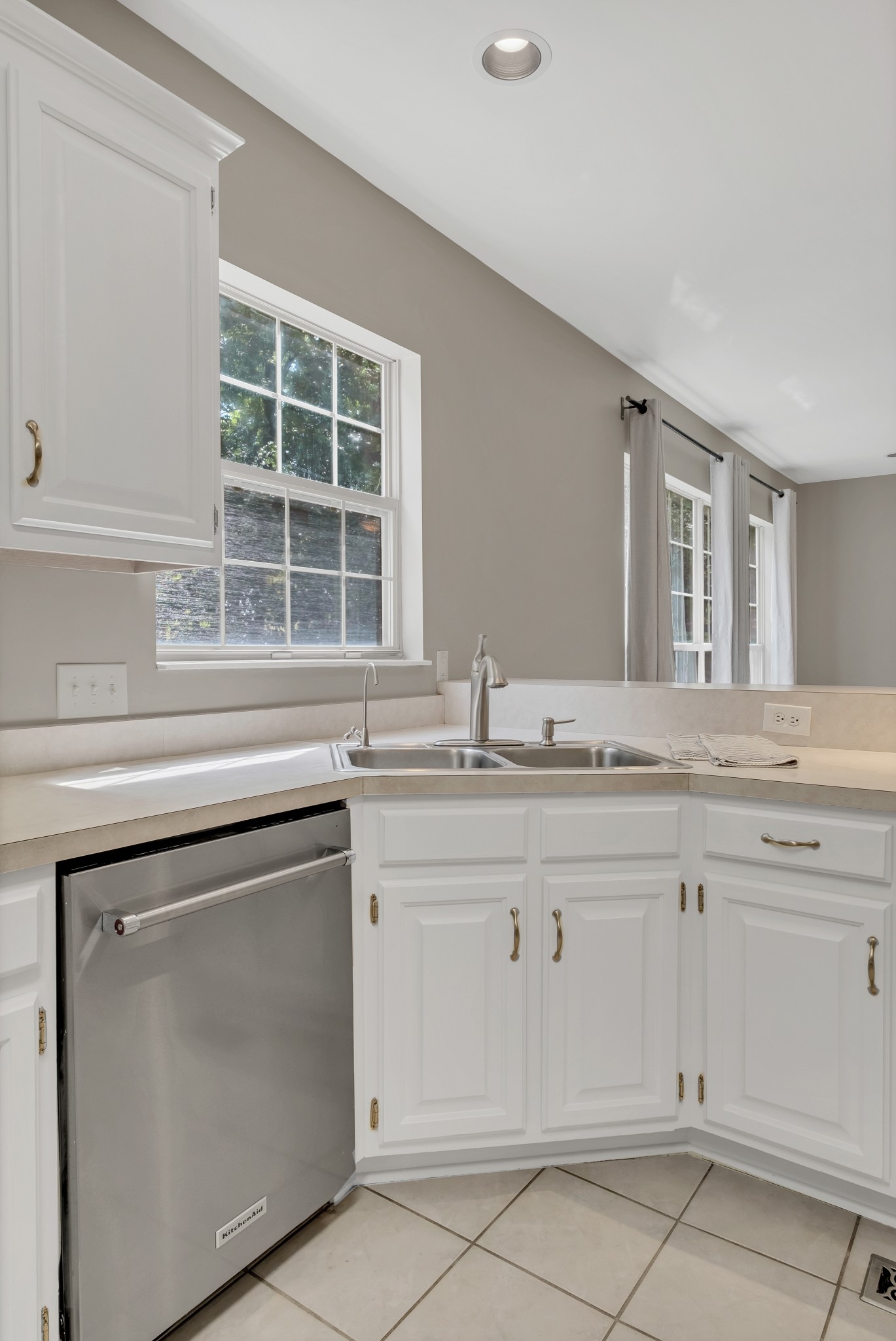 8169 Londonberry Road Nashville, TN 37221 - Photo 36 of 82 a kitchen with granite countertop white cabinets and a sink