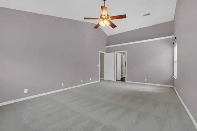a view of a swimming pool with a patio and a garden
