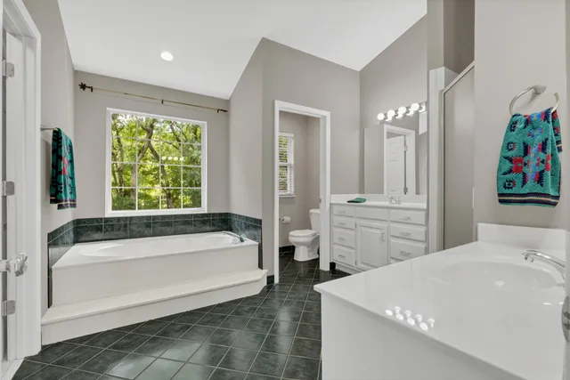 a backyard of a house with lots of green space