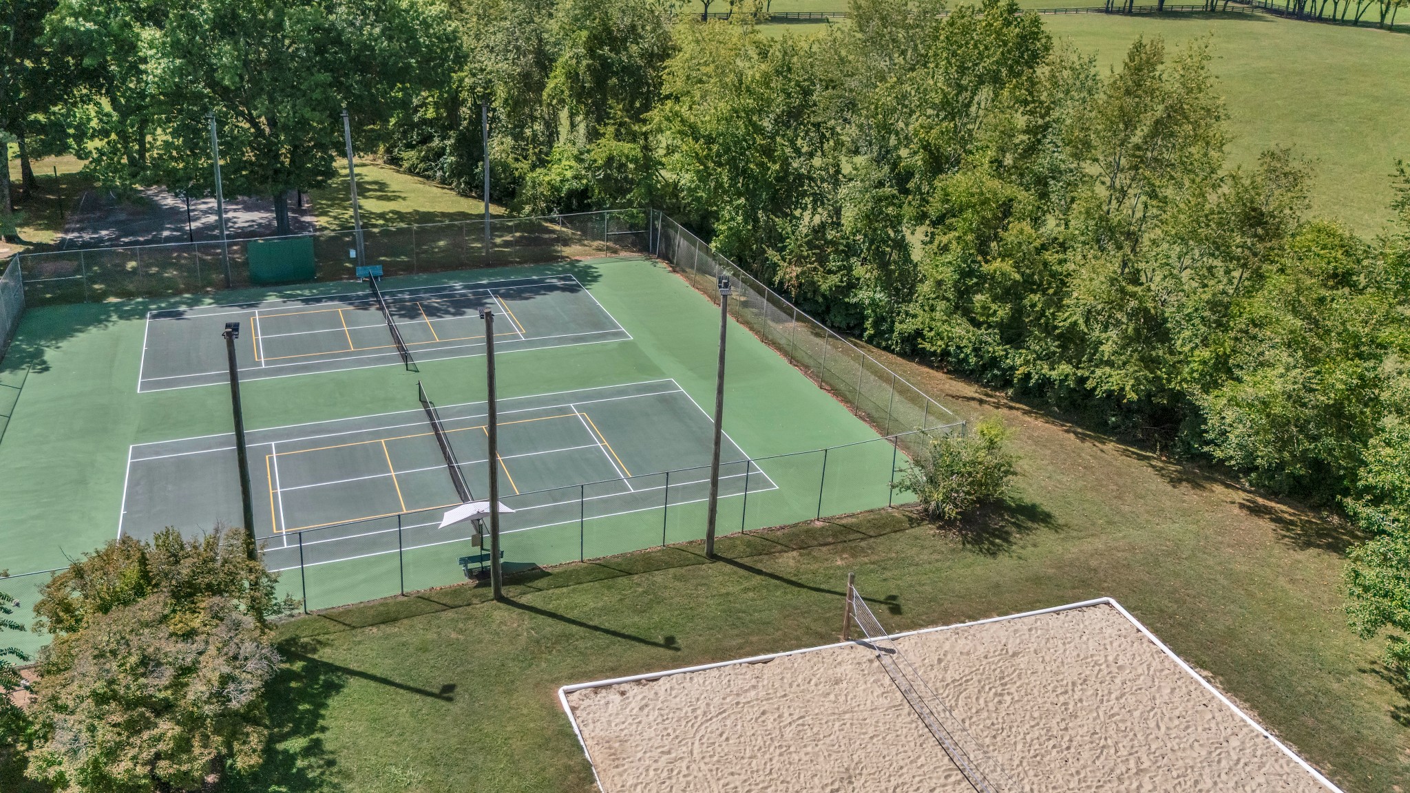 8169 Londonberry Road Nashville, TN 37221 - Photo 69 of 82 a backyard of a house with lots of green space