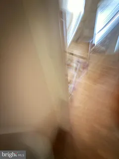 a room with furniture and a flat screen tv