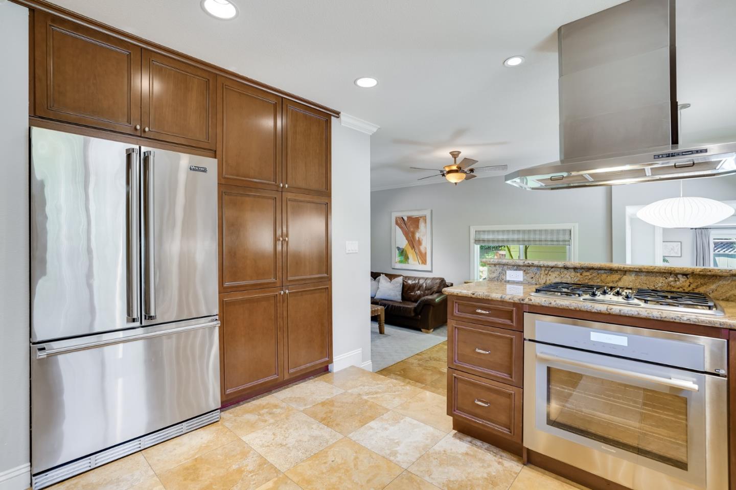 1990 Sharon Road Menlo Park, CA 94025 - Photo 15 of 40 a kitchen with a refrigerator stove and sink