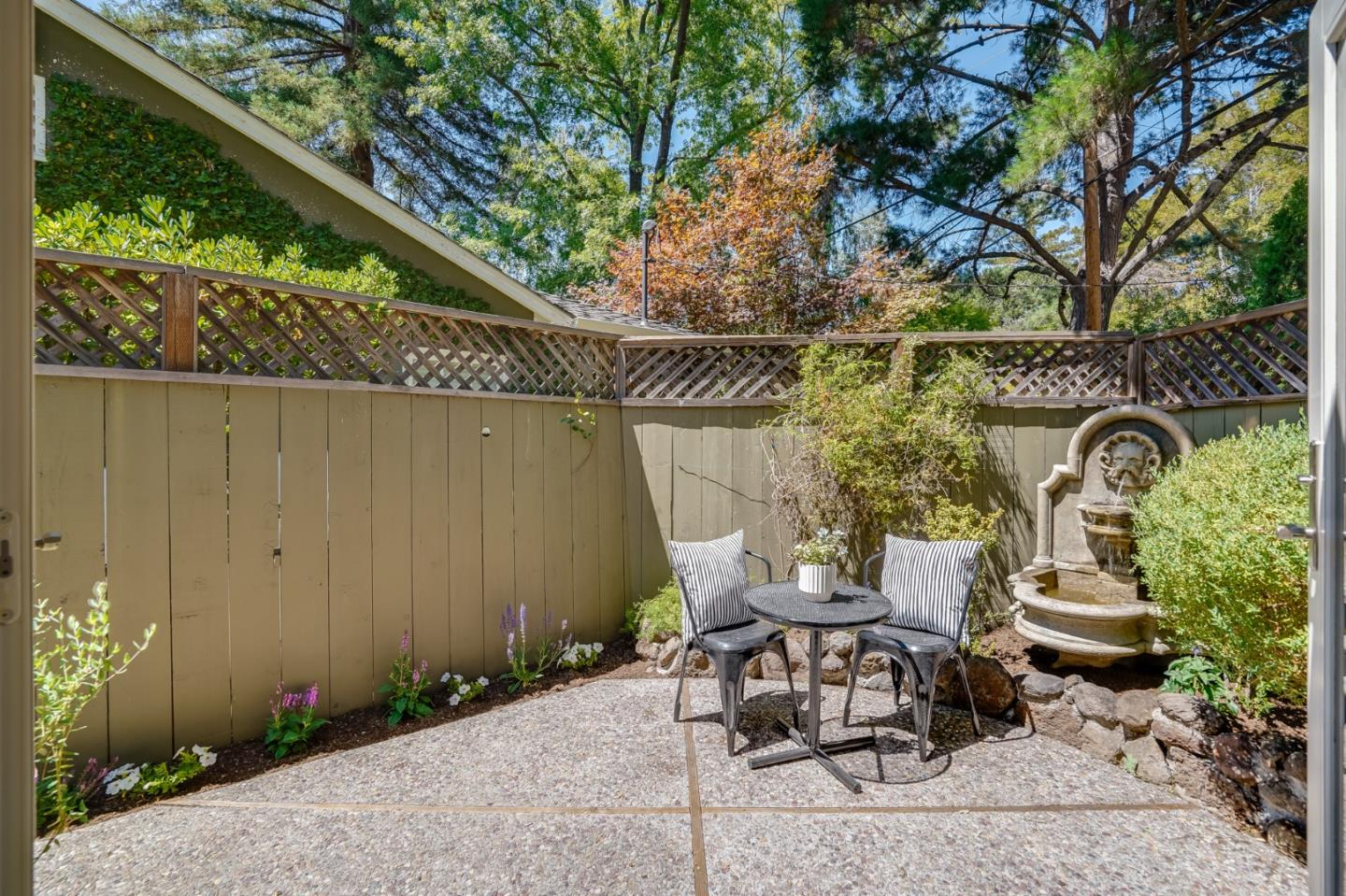 1990 Sharon Road Menlo Park, CA 94025 - Photo 21 of 40 a view of a chairs and table in backyard