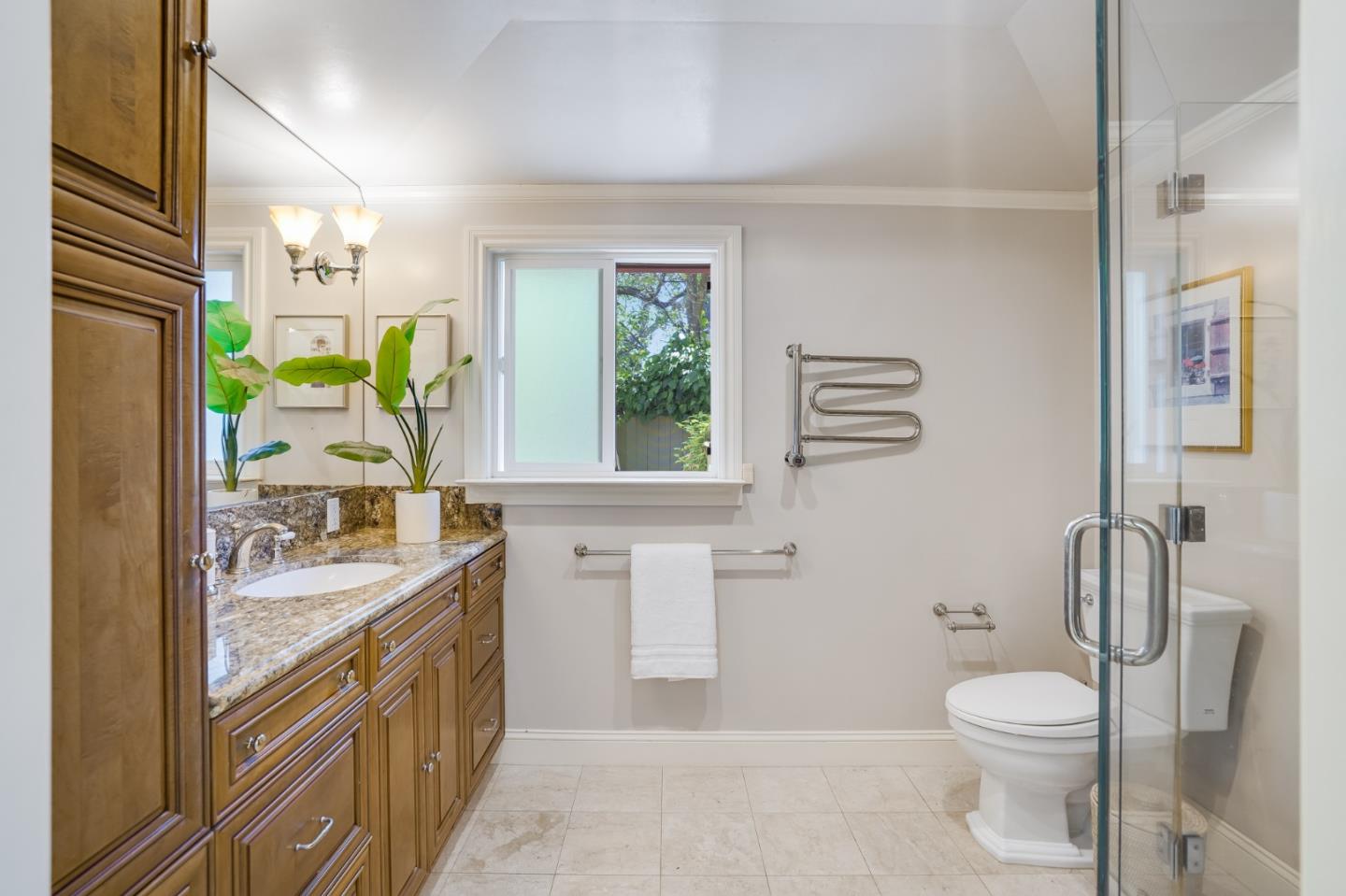 1990 Sharon Road Menlo Park, CA 94025 - Photo 23 of 40 a bathroom with a granite countertop toilet sink and mirror