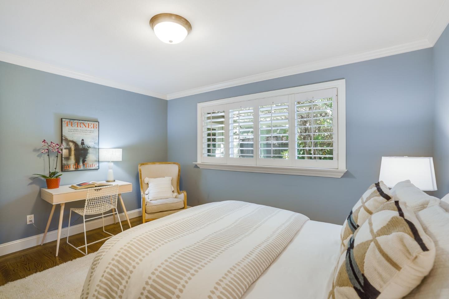 1990 Sharon Road Menlo Park, CA 94025 - Photo 28 of 40 a bedroom with a bed and a chair