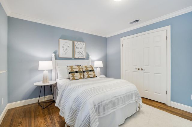 a bathroom with a sink a tub and a mirror