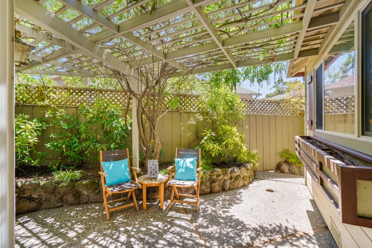 1990 Sharon Road Menlo Park, CA 94025 - Photo 33 of 40 a view of a patio with table and chairs and potted plants
