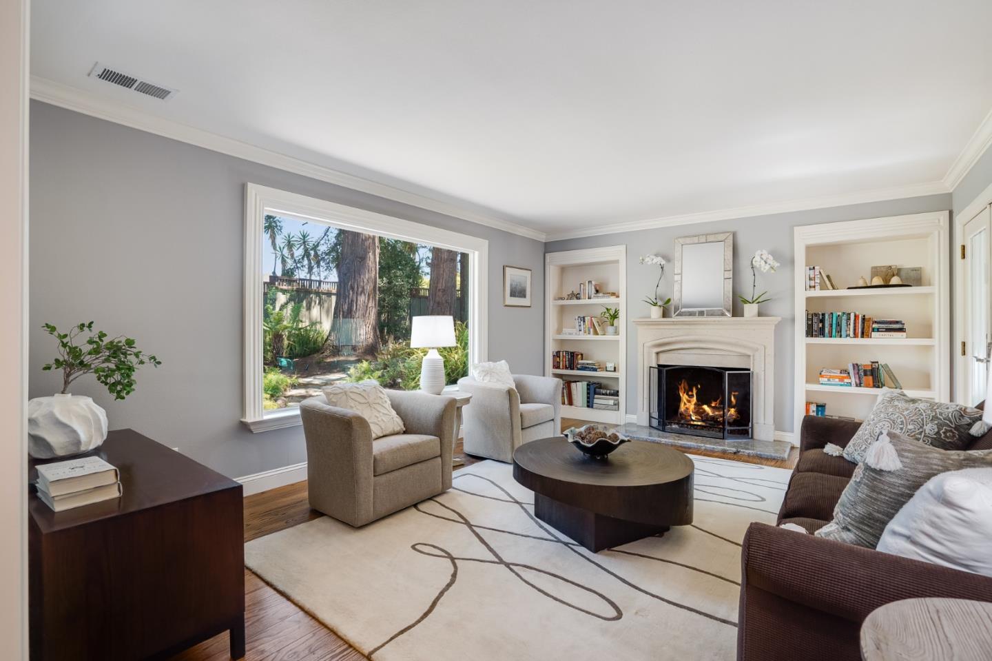 1990 Sharon Road Menlo Park, CA 94025 - Photo 7 of 40 a living room with furniture and a fireplace