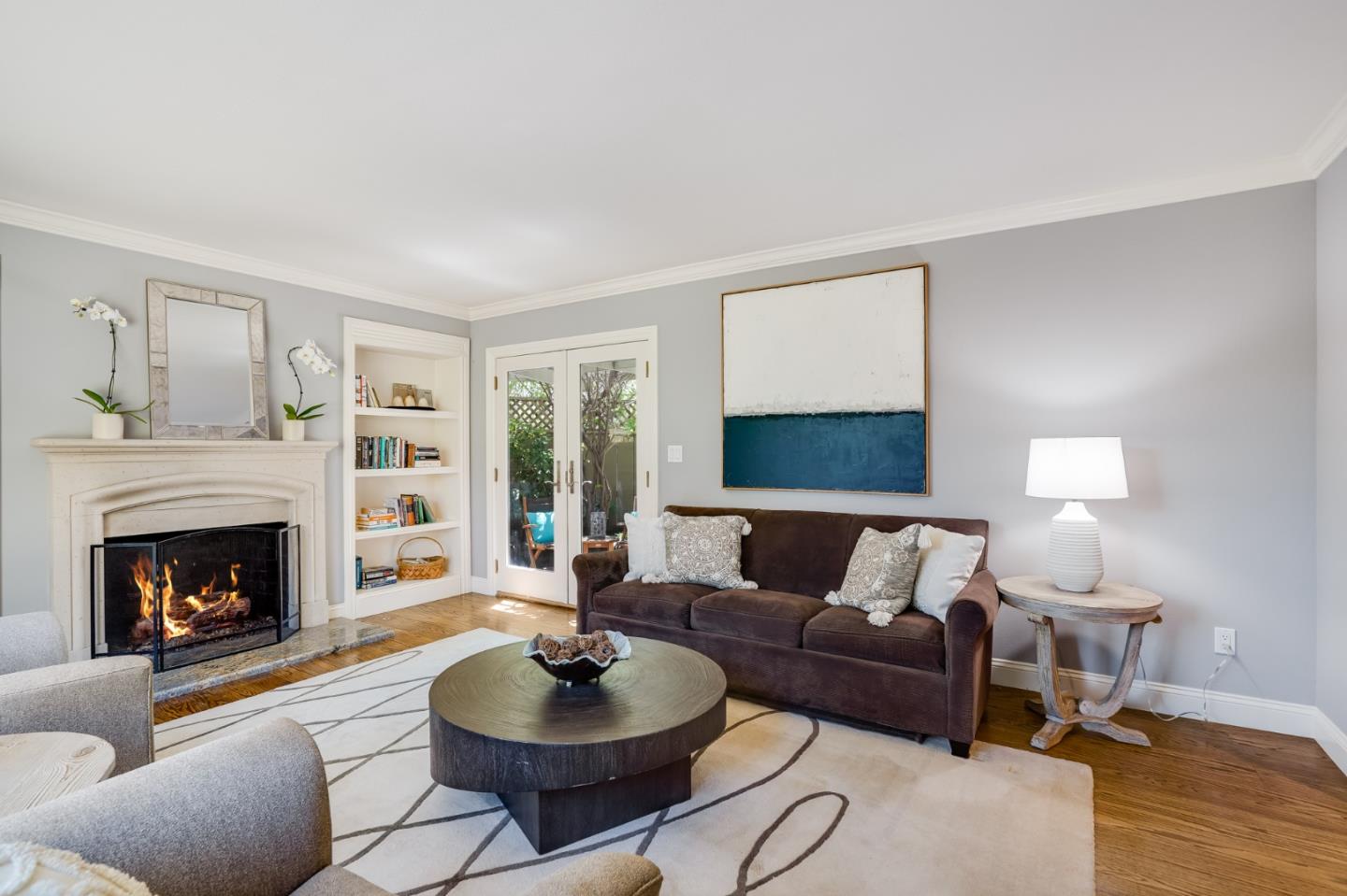 1990 Sharon Road Menlo Park, CA 94025 - Photo 9 of 40 a living room with furniture and a fireplace