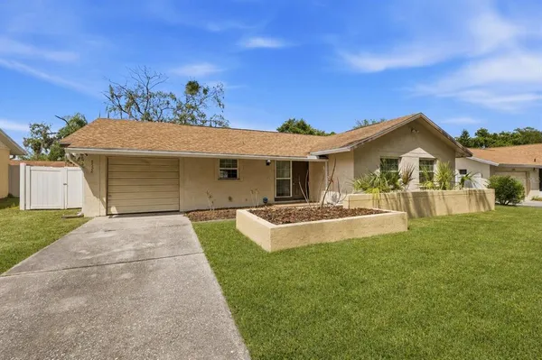 front view of a house with a yard