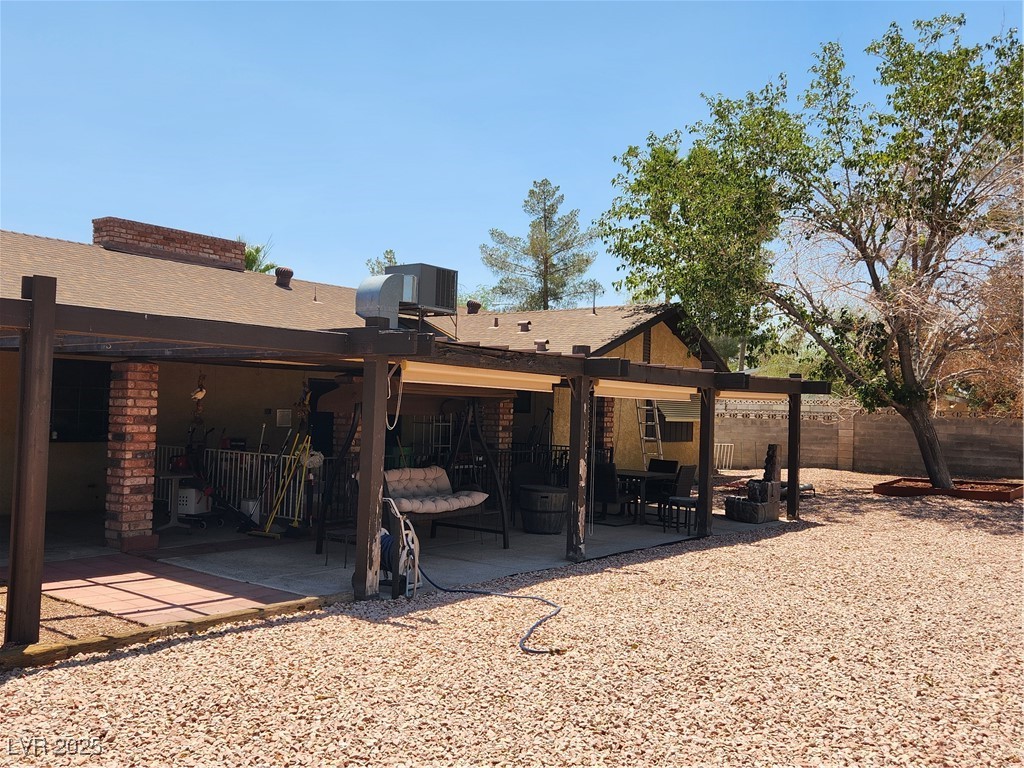 2645 South Lindell Road Las Vegas, NV 89146 - Photo 24 of 30 Back of house featuring a patio