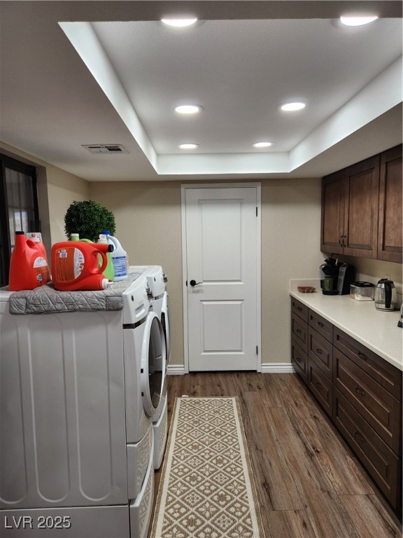 2645 South Lindell Road Las Vegas, NV 89146 - Photo 10 of 30 Laundry room with separate washer and dryer, dark wood-style floors, and recessed lighting