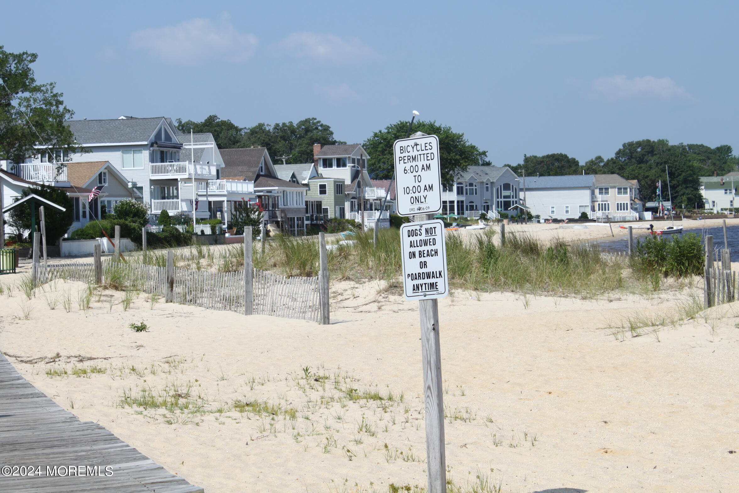 334 Bayview Avenue Ocean Gate, NJ 08740 - Photo 42 of 69 a view of a lake with a house