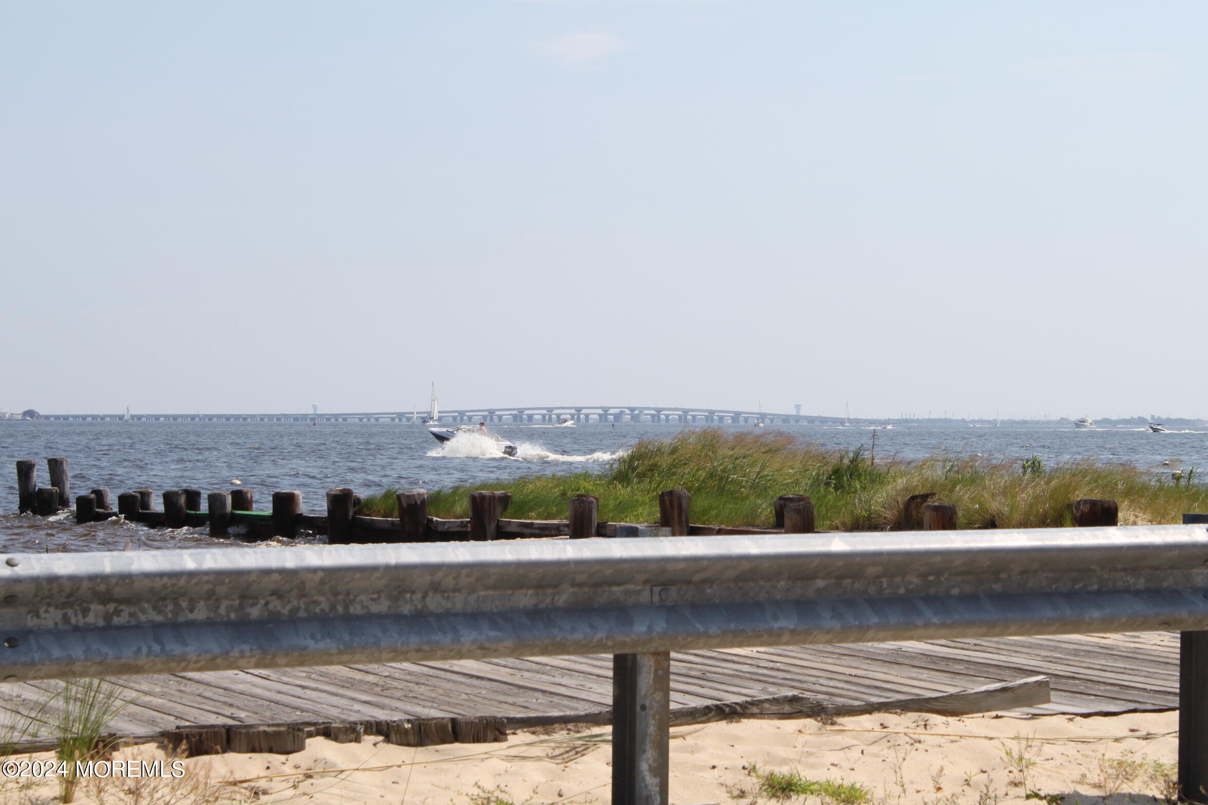 334 Bayview Avenue Ocean Gate, NJ 08740 - Photo 48 of 69 a view of a city from a lake