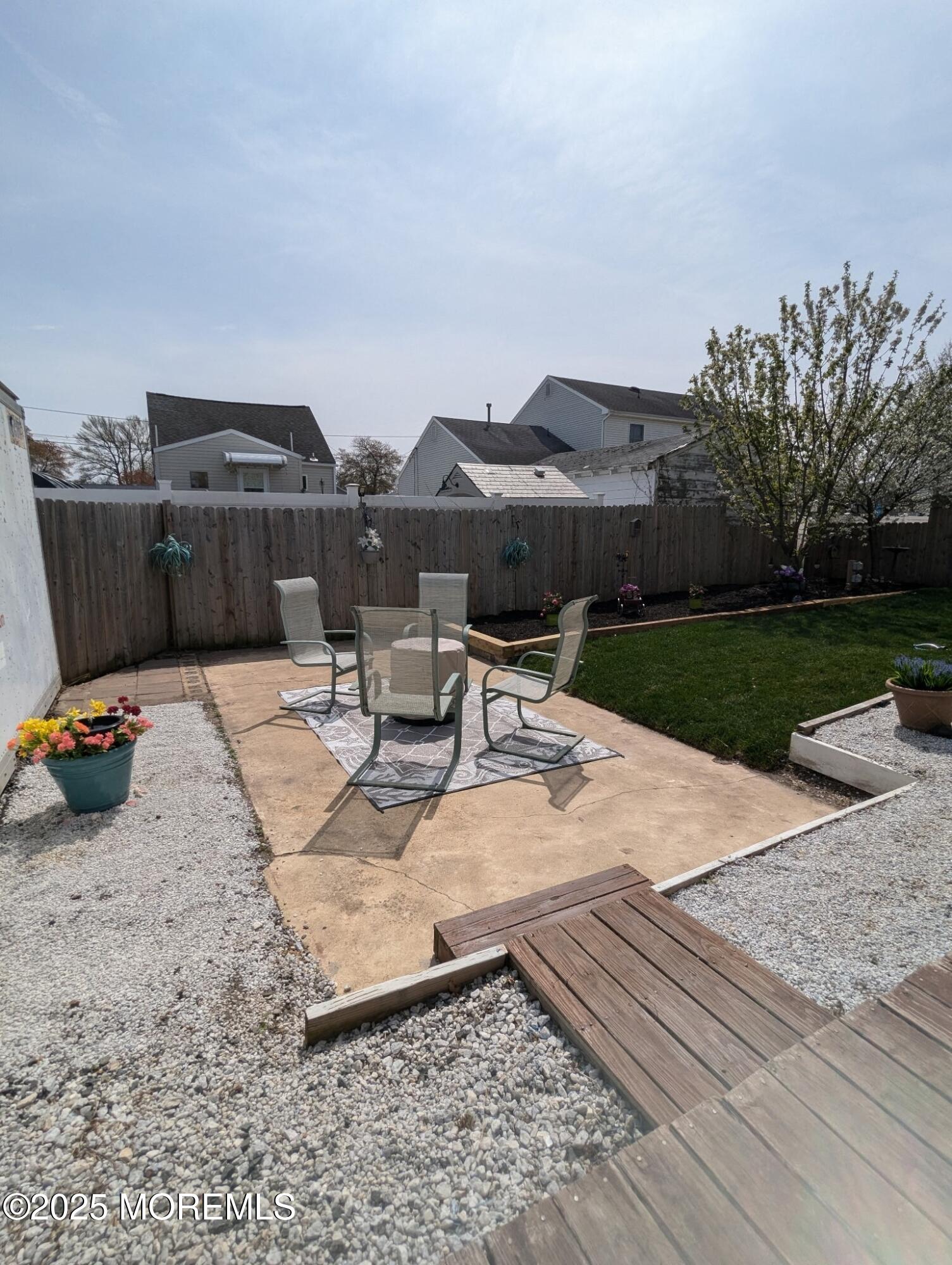 334 Bayview Avenue Ocean Gate, NJ 08740 - Photo 68 of 69 a view of a backyard with sitting area
