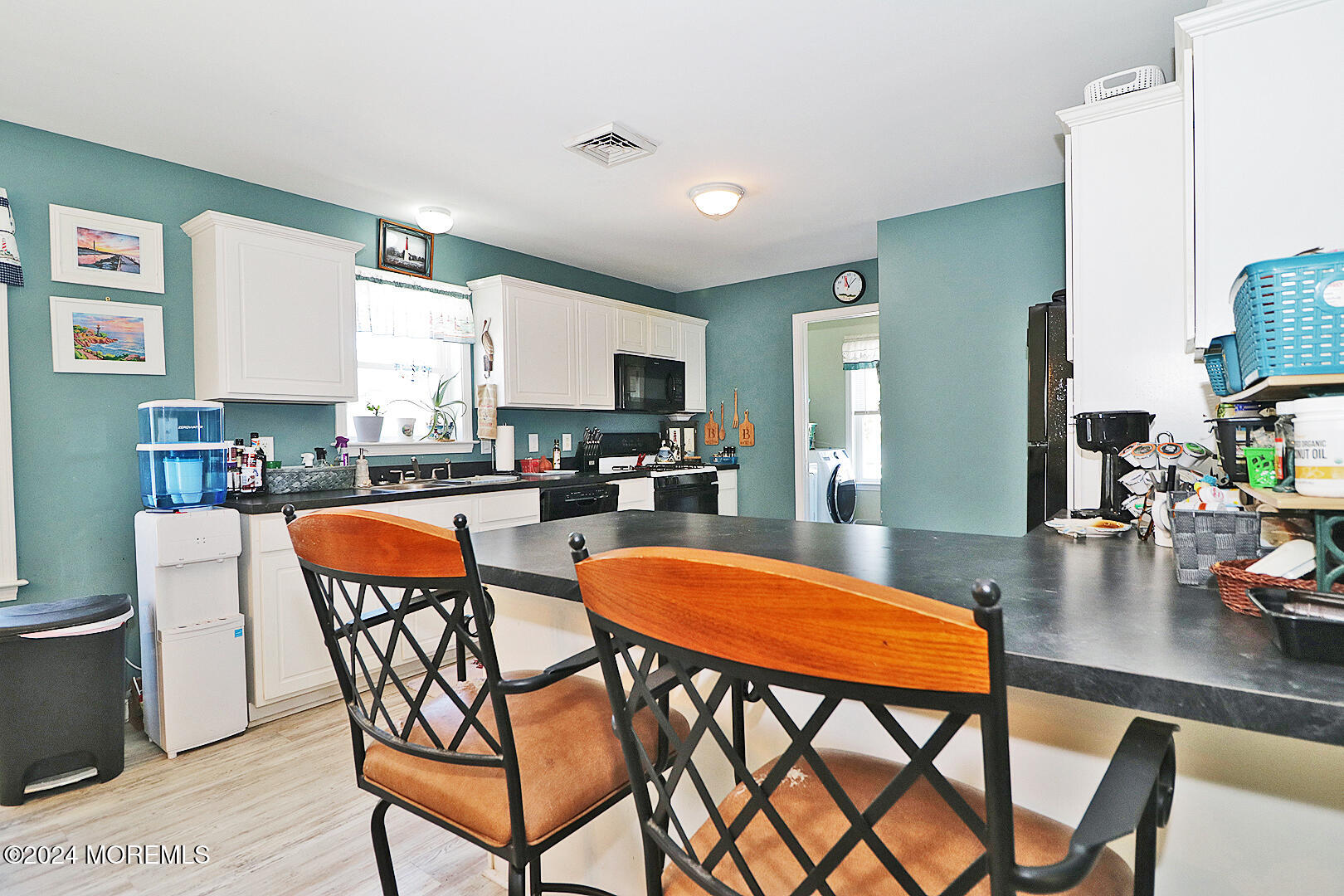 334 Bayview Avenue Ocean Gate, NJ 08740 - Photo 10 of 69 a view of a dining room with furniture and a kitchen view