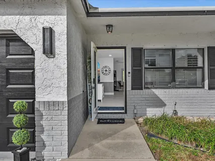 a front view of a house with a porch
