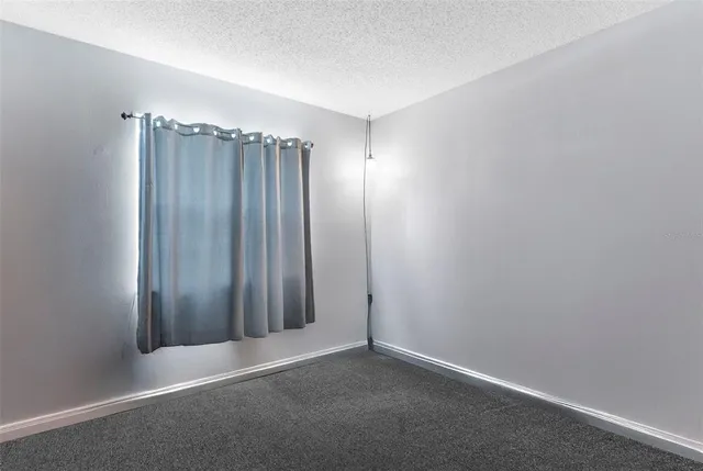 a view of a garden with a lake view