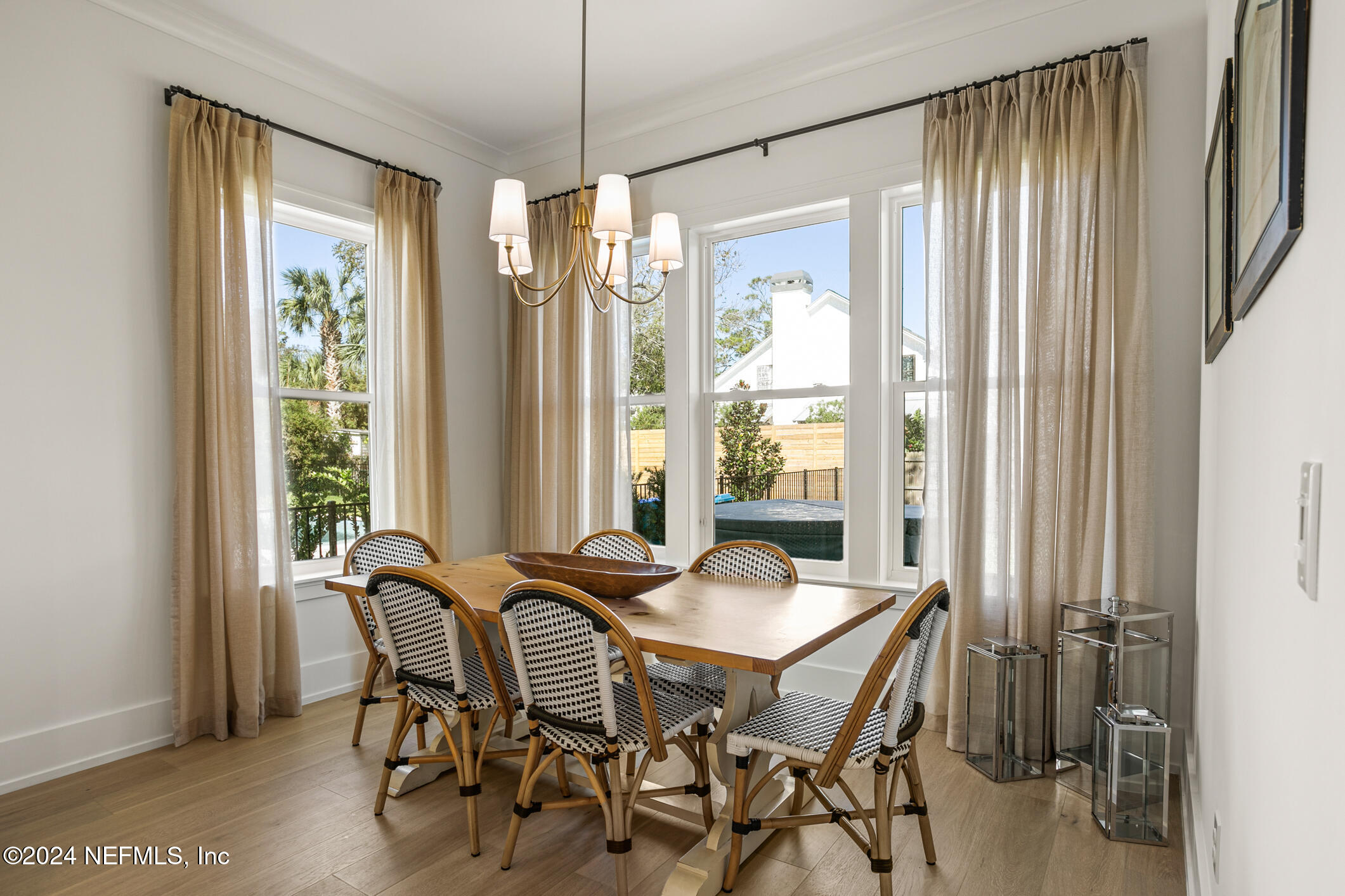 55 A Solana Road Ponte Vedra Beach, FL 32082 - Photo 16 of 42 a view of a dining room with furniture and window